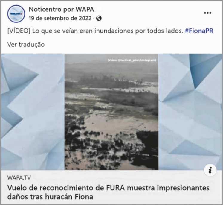 Imagem de uma publicação de rede social do canal de notícias 'Noticentro por WAPA', publicada em 19 de setembro de 2022. Está escrito: 'Vídeo' em maiúsculas e entre colchetes, seguido de 'Lo que se veían eran inundaciones por todos lados' e uma 'hashtag' escrito 'FionaPR'. Abaixo há a imagem do vídeo, mostrando uma paisagem destruída e alagada. O nome do vídeo é: 'Vuelo de reconocimiento de FURA muestra impresionantes daños tras huracán Fiona'.