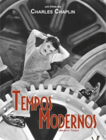Cartaz do filme 'TEMPOS MODERNOS'. Fotografia em preto e branco de um homem, sentado em engrenagens gigantes, com as mãos na cabeça.