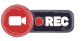 Ícone de uma filmadora inserida em um círculo com um retângulo , com um ponto vermelho inserido, escrito 'REC'. Representando vídeo.