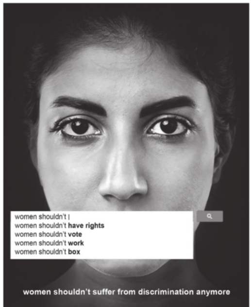 Fotografia em preto e branco do rosto de uma mulher. Sobre sua boca, há uma barra de pesquisa digital, como a de um site de buscas. Nela, aparecem sugestões automáticas com frases iniciadas por 'women shouldn't', seguidas de: have rights, vote, work e box, todas em destaque.
