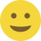 Emoji formado por um círculo amarelo, com olhos pretos e um sorriso discreto.