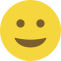 Emoji formado por um círculo amarelo, com olhos pretos e um sorriso discreto.