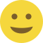 Emoji formado por um círculo amarelo, com olhos pretos e um sorriso discreto.