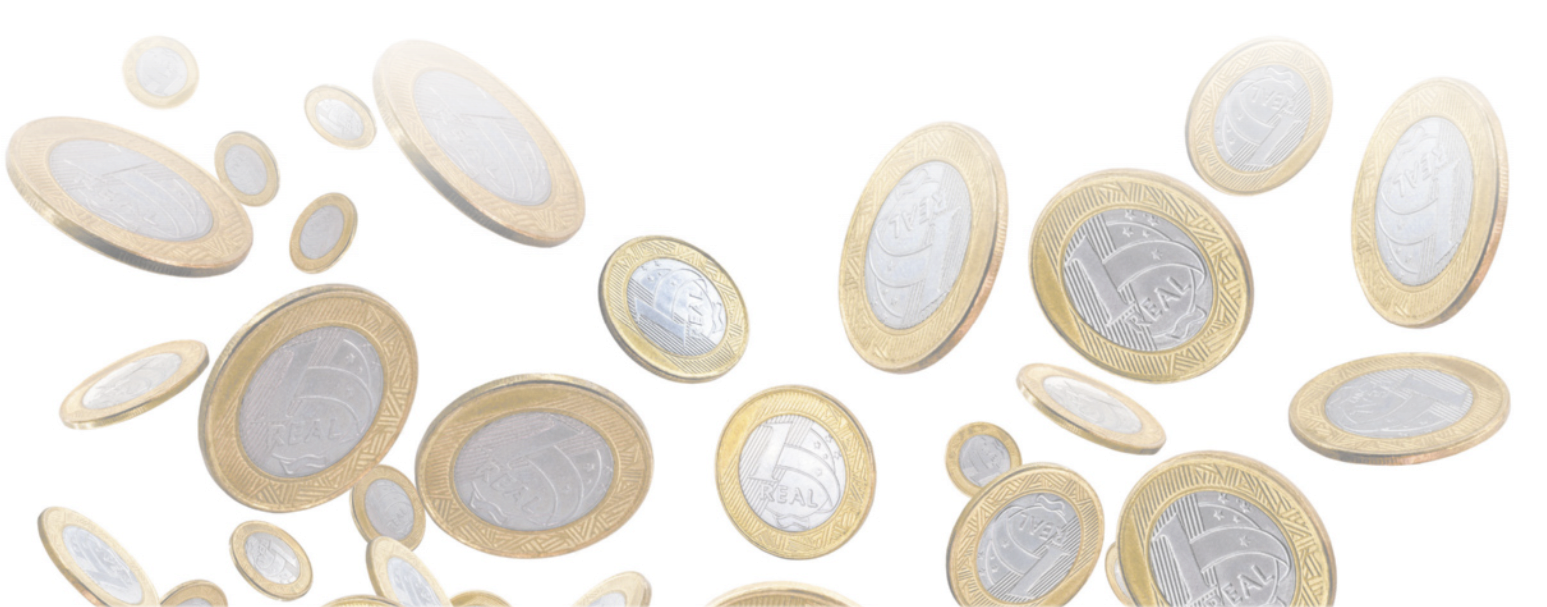 Imagem de várias moedas de 1 real, vistas em diferentes posições e ângulos. As moedas aparecem dispesas, com perspectiva de movimento.
