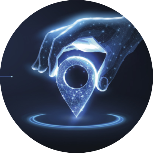 Representação digital em tons de azul de uma mão formada por pontos e linhas luminosas, segurando um marcador de localização semelhante ao usado em mapas digitais. A mão parece posicionar o marcador sobre um ponto circular brilhante, sugerindo o ato de marcar ou identificar um local em um ambiente virtual. O fundo é escuro, com efeitos de luz que destacam os elementos da cena.