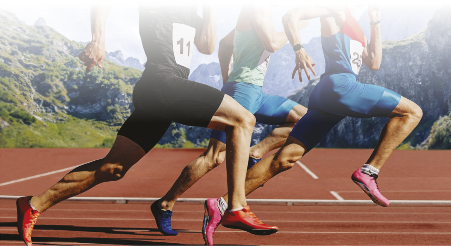 Imagem de três corredores em uma pista de atletismo.