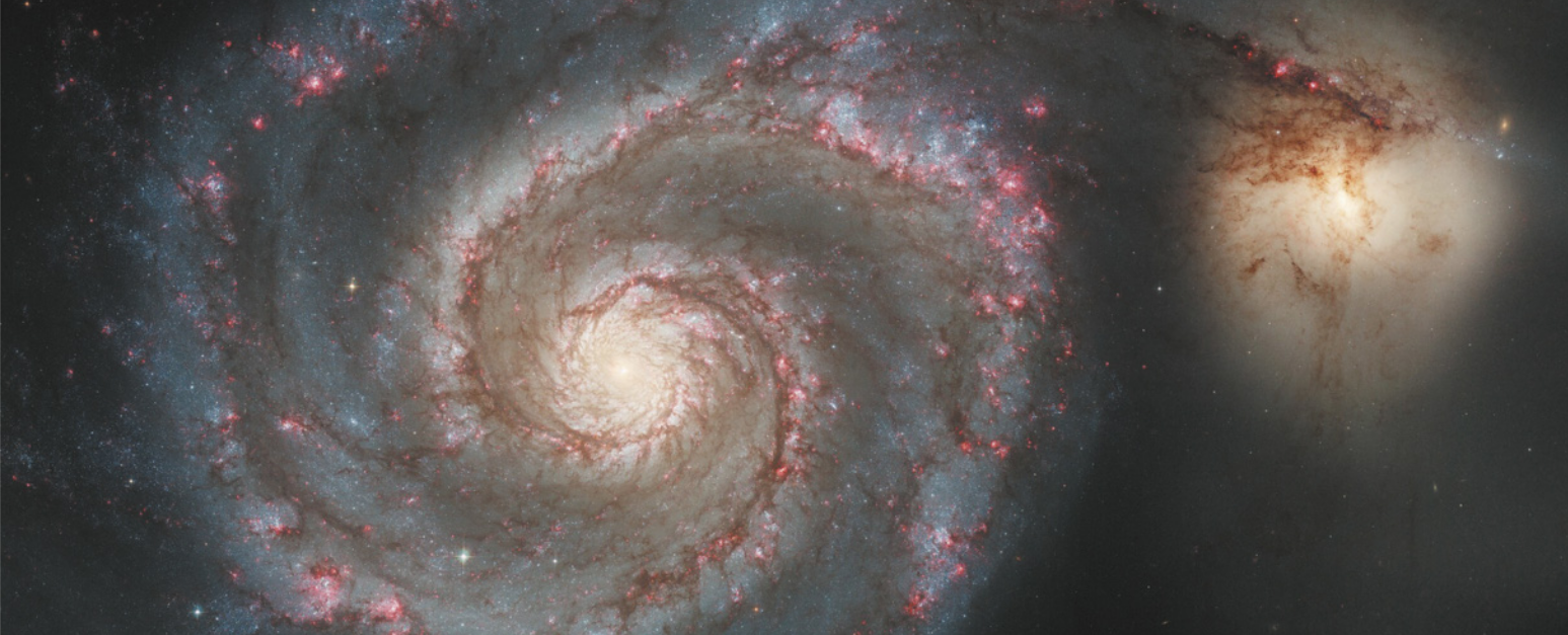 Imagem de galáxia em forma de espiral.