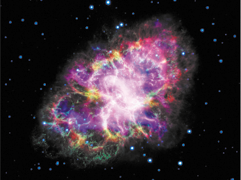 Fotografia de uma nebulosa. Ela é brilhante, tem o formato irregular com nuvens de coloração rosa, roxo e pequenas partes amarelas. Ao fundo há várias estrelas espalhadas.