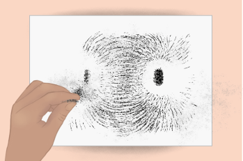 Ilustração da vista superior de uma folha de papel com uma mão jogando uma pequena porção de grafite em pó sobre ela. Na folha há duas regiões circulares com centro mais escuros e a borda em branco. Em torno das regiões circulares há riscos e pontos pretos que formam curvas que ligam uma região circular à outra.