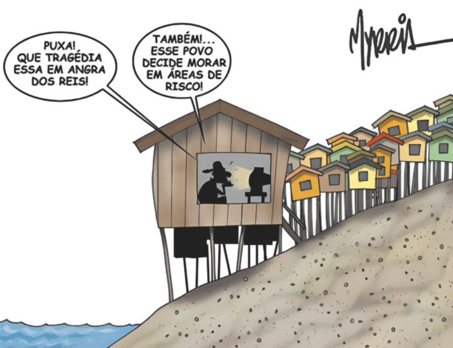 Charge sobre moradias em áreas de risco. Em uma palafita construída em um barranco, uma pessoa assiste televisão e comenta: 'Puxa! Que tragédia essa em Angra dos Reis! Também... esse povo decide morar em áreas de risco!'.