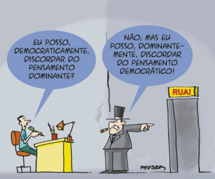 Charge sobre a liberdade de expressão. Um trabalhador está sentado diante de uma mesa e segura uma caneta. Na frente dele, encontra-se o patrão, que está fumando charuto. O trabalhador pergunta: 'Eu posso, democraticamente, discordar do pensamento dominante?'. Com expressão zangada, o patrão aponta para a porta e responde: 'Não, mas eu posso, dominantemente, discordar do pensamento democrático!'. Acima da porta, há uma placa com a palavra rua.