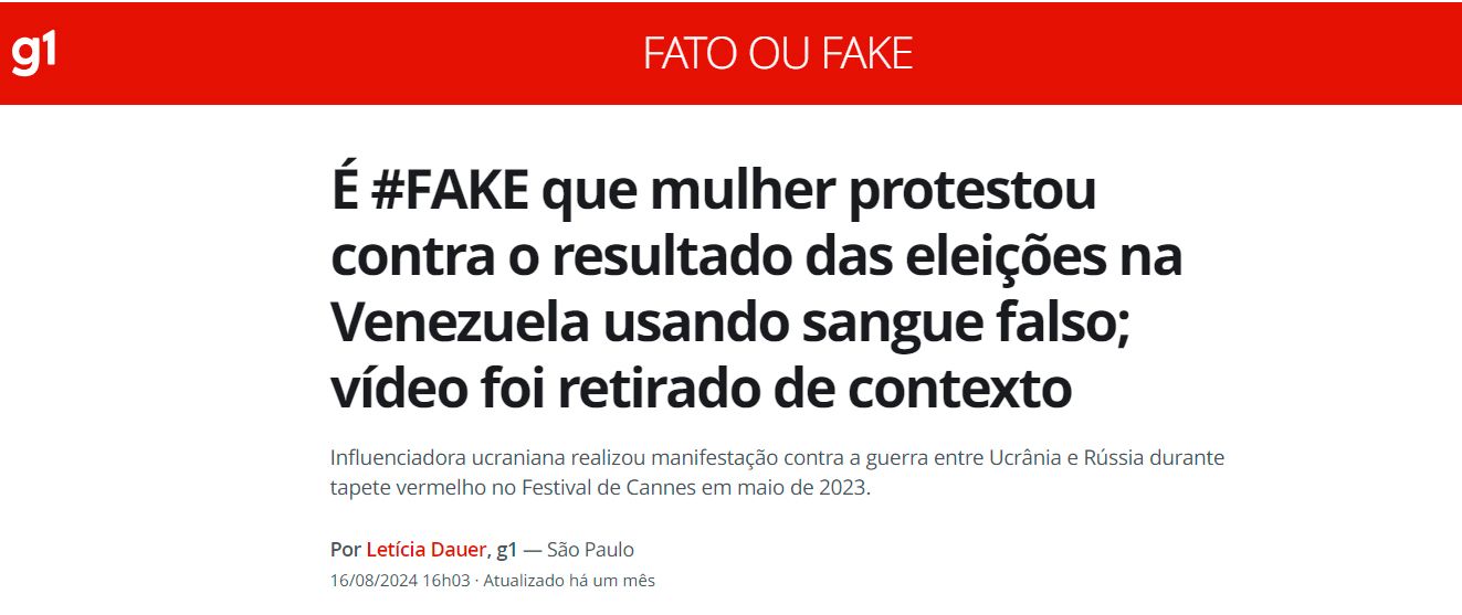 Reprodução de página de internet. Na parte superior, faixa vermelha com a inscrição: g1; FATO OU FAKE. Em seguida, o texto: É #FAKE que mulher protestou contra o resultado das eleições na Venezuela usando sangue falso; vídeo foi retirado de contexto. Influenciadora ucraniana realizou manifestação contra a guerra entre Ucrânia e Rússia durante tapete vermelho no Festival de Cannes em maio de 2023. 