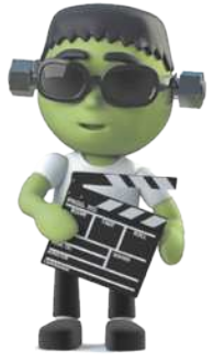 Imagem de um boneco Frankestein segurando uma claquete e usando óculos escuros.