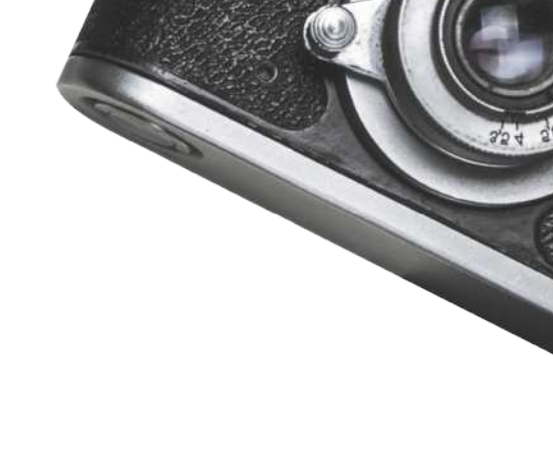 Imagem parcial de uma máquina fotográfica.